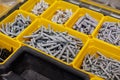 Storage case with screws, nuts, bolts, nails and other small tools for handyman, close up Royalty Free Stock Photo
