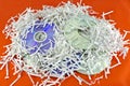 Storage discs and shredded paper sheets Royalty Free Stock Photo