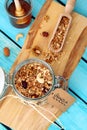 Storage jar with granola grain shovel and honey dipper Royalty Free Stock Photo