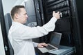 Storage maintenance. Service engineer in server room Royalty Free Stock Photo