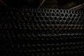 Storage and maturation of champagne bottles in a dark cellar. Generative ai Royalty Free Stock Photo