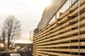 Storage of piles of wooden boards on the sawmill. Boards are stacked in a carpentry shop. Sawing drying and marketing of