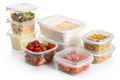 Storage plastic food containers isolated over white Royalty Free Stock Photo