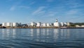 Storage silos,fuel depot of petroleum and gasoline on the banks of the river in western Germany on a beautiful blue sky with cloud