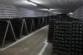 The storage of sparkling wine in a wine cellar. Royalty Free Stock Photo
