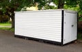 Storage Unit Box on Neighborhood Street Royalty Free Stock Photo