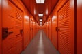 Storage units rent. Man in warehouse hallway. Guy carries boxes into storage units. Doors to warehouse units are closed Royalty Free Stock Photo