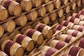 Storage, winery cellar and wood barrel collection or red wine, alcohol and luxury, vineyard industry container and Royalty Free Stock Photo