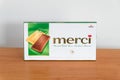 Storck Merci chocolate in a box on wooden table