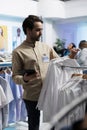 Store assistant checking inventory