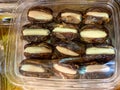 Store-bought plastic box with  stuffed dates Royalty Free Stock Photo