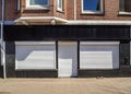 Facade of a shop with closed shutters