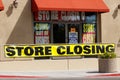 Store Closing and Going out of Business signs displayed at a soon to be closed store I Royalty Free Stock Photo