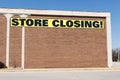 Store Closing Sign on a department store going out of business IV Royalty Free Stock Photo