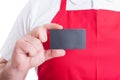 Store employee showing empty business card Royalty Free Stock Photo