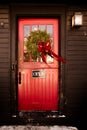 Store entrance door with open sign and Christmas wreath Royalty Free Stock Photo