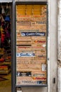 Store exterior decorated with old wooden fruit boxes in Rome, Italy
