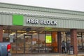A store front H&R Block tax preparation office in a New Jersey strip mall. Offering financial advice and tax preparation Royalty Free Stock Photo