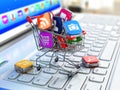 Store of laptop software. Apps icons in shopping cart. Royalty Free Stock Photo