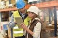 Store manager and warehouseman at work Royalty Free Stock Photo