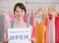 Store owner holding open sign Royalty Free Stock Photo