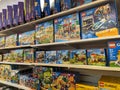 Store shelf filled with lego City and other lego toys