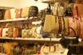 Store showcase with various womens bags.