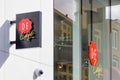 Store sign of a Douwe Egberts coffee bar, a Dutch brand of coffee which is majority-owned by JDE Peet\'s, in Arnhem, The