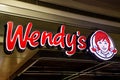 Store sign at the entrance to Wendy\'s Fast Food Resturant