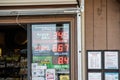 Store signs showing lottery game jackpots