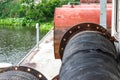 Stored old water cylinder and dredging pipes on a ship close up with copy space Royalty Free Stock Photo