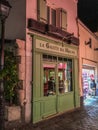 Storefront of bakery La Galette des Moulins at night on Montmartre, Paris, France Royalty Free Stock Photo