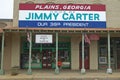 Storefront with banner exclaiming Plains Georgia to be the home of Jimmy Carter, our 39th President in Plains, Georgia Royalty Free Stock Photo