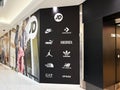 Storefront Display Showcasing Popular Clothing and Footwear Brands with Stylish Advertisements