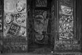 Storefront plastered with graffiti and posters Royalty Free Stock Photo