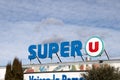 Storefront of a Super U branded supermarket with the brand name and logo.