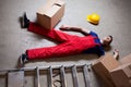 Storekeeper lying on the floor Royalty Free Stock Photo