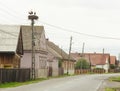 Stork bird nest on a pole and street Royalty Free Stock Photo