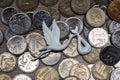 Stork bringing children on the background of coins, Russian money, metal coins, spending on children