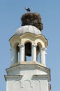 Stork in nest on dome of a church Royalty Free Stock Photo