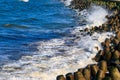 Storm in the Baltic sea. Storm waves crashing on the breakwater in Darlowo, Poland Royalty Free Stock Photo