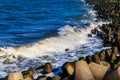 Storm in the Baltic sea. Storm waves crashing on the breakwater in Darlowo, Poland Royalty Free Stock Photo