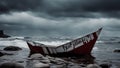 storm on the beach A scary paper boat with the word death written on it, sinking on a black sea with storms, Royalty Free Stock Photo