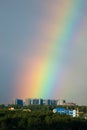 After the storm beautiful bright double rainbow over the city