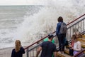 Storm on the Black Sea. Dirty water and big waves. People on the shore