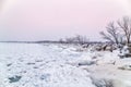 A storm break on Port Dalhousie covered in ice and snow in winter