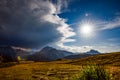 A storm cloud is coming in the sun. The beginning of the storm. Royalty Free Stock Photo