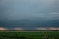 Fallstreaks of rain or hail below the base of thunderstorm Royalty Free Stock Photo