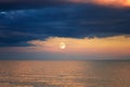 Storm cloud over the sea. sunset. moon rise Royalty Free Stock Photo