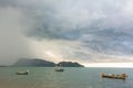 Storm cloud with rain over the sea Royalty Free Stock Photo